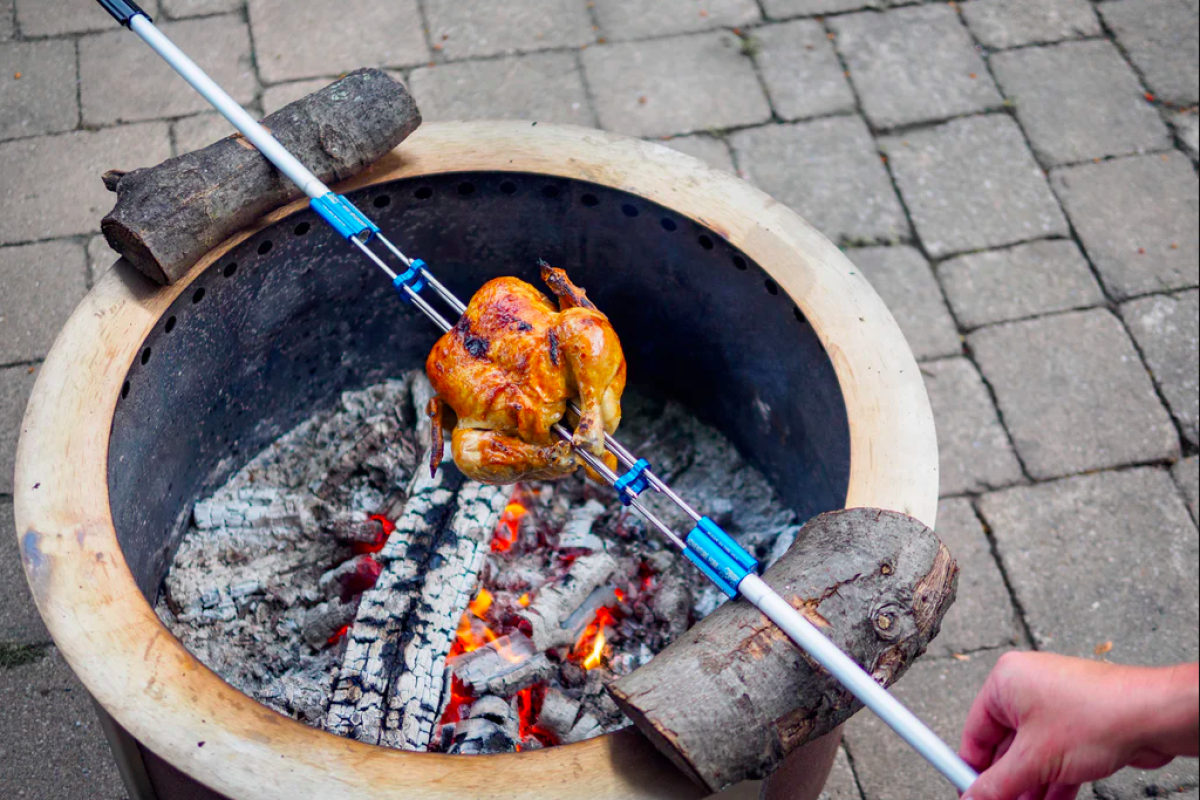 Light packable rotisserie raises bar for backcountry campfire cooking